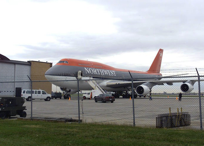 A NorthWest plane that diverted to Winnipeg behind the airfield fence.